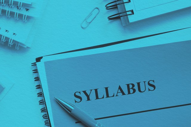 Syllabus educational plan and papers on a desk