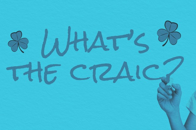 "What's the craic?" written with marker and four leaf clovers