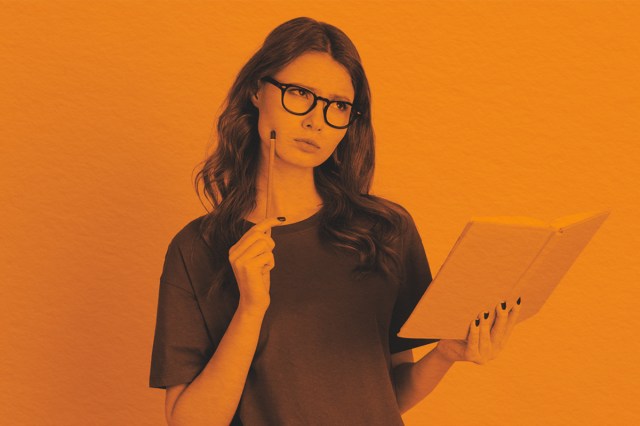 Confused facial expression of a writing student