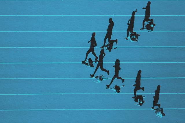 Aerial view of a group of people running on a track