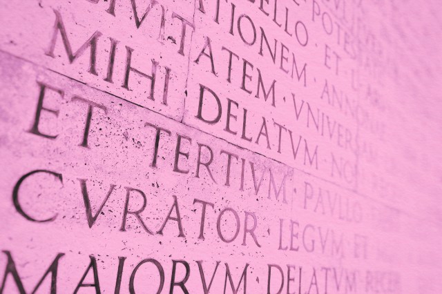 ancient roman epigraph on a marble wall
