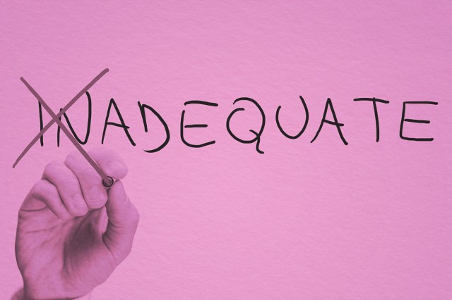 the word inadequate written on board